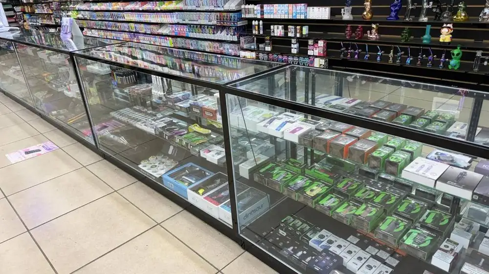 Vape devices and kits displayed inside Julian Tobacco & Vape