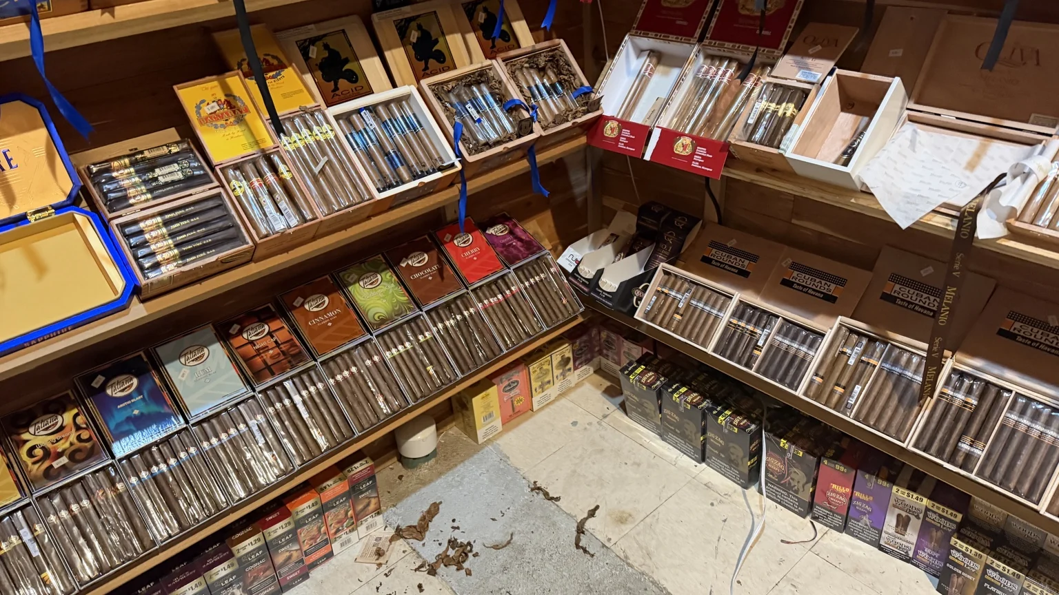 Cigar display corner with assorted cigar boxes at Julian Tobacco & Vape